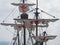 The masts sails and rigging of the santa maria a historic sailing ship in funchal harbour with white sails with red crosses