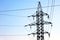 Masts and wires on a background blue sky. electric power industry