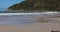 Matadeiro beach with mountains and ocean with waves in Florianopolis