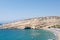 Matala beach on the boundaries of the plain Messara and Asteroussia Mountains on the Crete island, Greece.