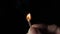 A match stick scratched ignites catches fire in 4x slow motion