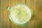 Matcha Green Tea Beverage and Milk Froth and Top View Green Tea Powder Topping in Vintage Tone