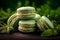 Matcha macaroons close-up on a wooden table, rustic background. Matcha green tea macarons with vanilla and pistachio cream, matcha