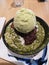 Matchaâ€‹ Ice-cream and shaved ice have topping. It's famous desert so sweet and cold.