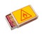 Matchbox isolated with hazard sign.