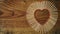 Matches on a wooden background form abstract heart. Copy space for text. Passionate hot love concept