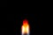 Matchstick flame with black background