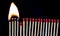 Matchsticks on fire in row of burning is sequence while one match stay down from burning to avoid fire connecting, social stop