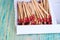 Matchsticks over wooden background