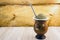 The mate, or chimarrÃ£o, is a characteristic drink of Southern South American culture. It consists of a gourd, a pump, ground mate