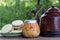 Mate and kettle with a plate of Argentine alfajores and yerba mate infusion