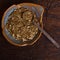 Mate on plate on wooden background