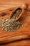 Mate with wooden scoop on wooden background