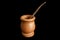 Mate wooden tea popular in Argentina on black background