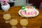 maternal grandmother birthday cake decorated with candles and juice glasses at coffee table