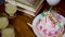 maternal grandmother birthday cake decorated with candles and juice glasses at coffee table