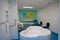 Maternity ward in a hospital with a bath for birth in water