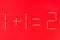 Mathematical addition of numbers using matches on red background