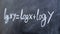 mathematical equations written on a blackboard