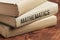 Mathematics subject book concept on a wooden table for learning