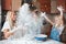 Mather daughter and son throws flour in each other
