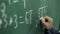 Maths` chalkboard. Hand`s writing simple mathematical equation