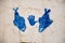 MATMATA, TUNISIA - February 03, 2009: Picture of a hand and fish symbol on traditional berber house wall in the sahara
