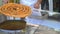 Matosinhos, Portugal - 21.06.2022: A man making churros in a bar