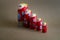 Matryoshka dolls lined up by size with a seamless background