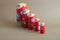 Matryoshka dolls lined up by size with a seamless background