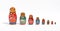 Matryoshka dolls, in a row, in order of size