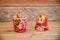 Matryoshkas, russian nesting dolls on wood background, mother, daughter and family concept