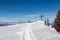 Matschacher Gupf - Panoramic hiking trail trough deep snow leading to the mountain summit in Karawanks,