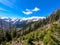 Matschacher Gupf - A panoramic view on Baeren Valley in Austrian Alps. The highest peaks in the chain are snow-capped