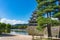 Matsumoto castle with pine trees and defence pond