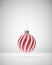 Matt red and white striped Christmas ornament