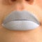 Matte Lipstick MakeUp MockUp. Part of the Face, Beautiful Female Lips CloseUp with a White Colorless Make Up Template.