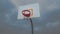 Matte on low angle basketball hoop with moody sky