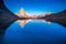 Matterhorn iconic mountain and lake relfection at peaceful sunrise, Swiss Alps