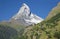 The Matterhorn peak over Mattertal valley in Valliser alps