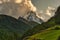 Matterhorn peak wtih clouds and old trees. Switzerland