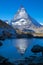 The Matterhorn reflected in an alpine lake