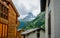 Matterhorn summit view in the clouds in middle of chalet houses Zermatt Switzerland