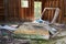 Mattress and broken bed frame in an abandoned shack