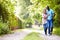 Mature African American Couple Walking In Countryside