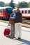 Mature aged couple at train station