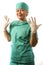 Mature attractive and happy medicine doctor woman or hospital nurse in medical scrubs latex gloves and mask smiling confident