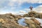 Mature backpacker on a mountain ridge