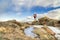 Mature backpacker on a mountain ridge