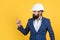 mature bearded man or businessman in costume and helmet, architechture